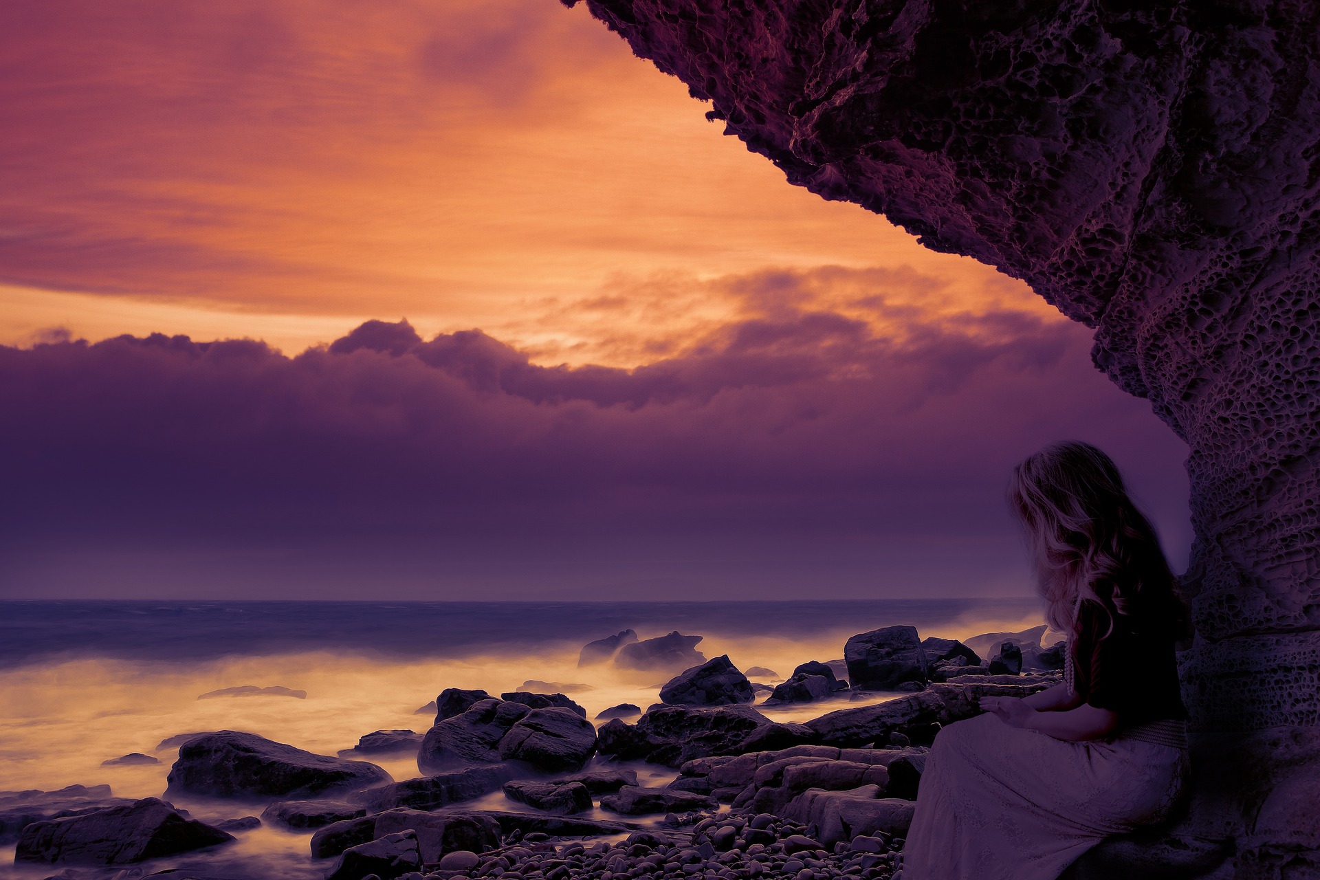 Woman thinking on the beach